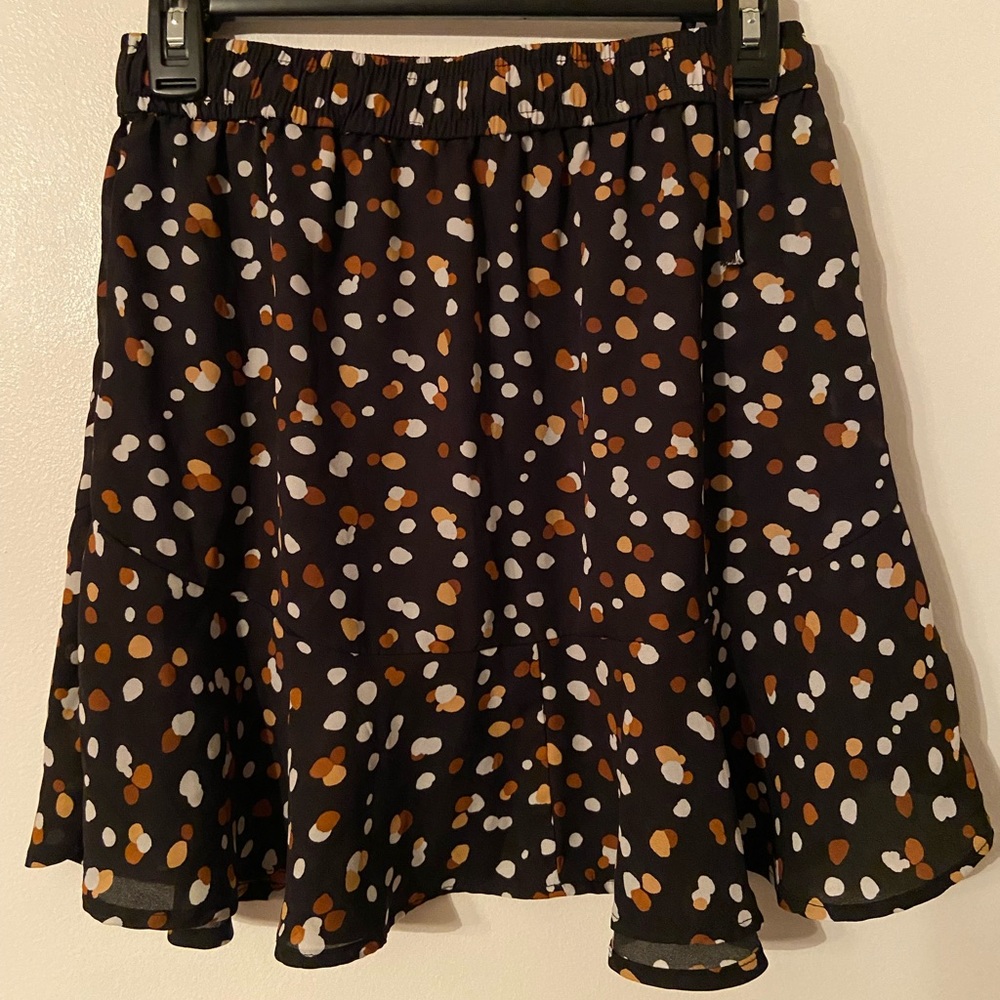Black skirt with brown, gold, white pokadots